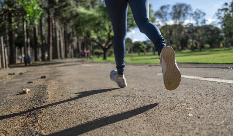 Legs of a woman jogging.